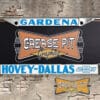 A vintage style reproduction dealership license plate frame for the Hovey Dallas Chevrolet dealership of Gardenia . This reproduction dealership license plate frame will look great bolted on to your Classic Chevy whether it’s a Cruiser, a Hot Rod or a Muscle Car.
