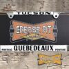 Quebedeaux Pontiac Tucson License Plate Frame Tribute