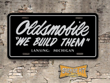 Oldsmobile "We Build Them" License Plate