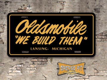 Oldsmobile "We Build Them" License Plate