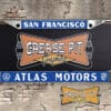A newly produced vintage style Atlas Motors San Francisco California reproduction dealership license plate frame for your Hot Rod, Vintage Classic car, or Muscle car.
