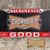 A vintage style reproduction Good Chevrolet license plate frame from the defunct dealership of Sacramento, California . This reproduction dealership license plate frame will look great bolted on to your Classic Chevy whether it’s a Cruiser, a Hot Rod or a Muscle Car.