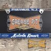 A vintage style reproduction dealership license plate frame for the Malcolm Konner Chevrolet dealership of Paramus. This reproduction dealership license plate frame will look great bolted on to your Classic Chevy whether it’s a Cruiser, a Hot Rod or a Muscle Car.