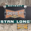 A vintage style reproduction dealership license plate frame for the Stan Long Pontiac dealership of Detroit. This reproduction dealership license plate frame will look great bolted on to your Classic Pontiac whether it's a Cruiser, a Hot Rod or a Muscle Car.