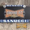 A newly produced vintage style Sanucci VW Volkswagen reproduction dealership license plate frame for your Hot Rod, Vintage Classic car, or Muscle car.
