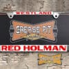 A vintage style reproduction dealership license plate frame for the Red Holman dealership of Westland. This reproduction dealership license plate frame will look great bolted on to your Classic Pontiac whether it's a Cruiser, a Hot Rod or a Muscle Car.