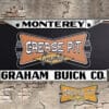 A vintage style reproduction dealership license plate frame for the Graham Buick dealership of Monterey. This reproduction dealership license plate frame will look great bolted on to your Classic Buick whether it's a Cruiser, a Hot Rod or a Muscle Car.