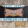 A vintage style reproduction dealership license plate frame for the Rambler City dealership of San Jose. This reproduction dealership license plate frame will look great bolted on to your classic Rambler whether it’s a Cruiser or a Hot Rod.